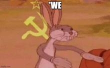 bugs bunny is standing in front of a hammer and sickle and a star .