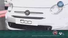 a white fiat 500 is being advertised on a tv channel