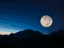 a full moon is visible in the night sky