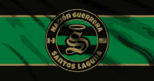 a logo for nacion guerrera santos laguna is on a green and black flag