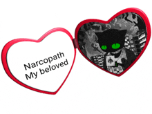 a red heart shaped mirror with narcopath my beloved written on it