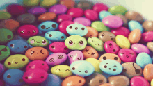 a bunch of colorful candies with faces on them