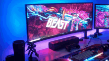 a computer monitor displays the word beast on the screen