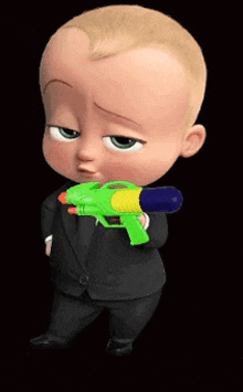 a baby in a suit and tie is holding a water gun