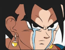 a cartoon character is crying with a tear running down his face .