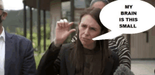 a woman with a speech bubble that says ' my brain is this small '