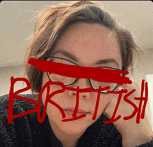 a woman with glasses and the word british written on her face