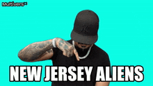 a man flexes his muscles in front of a blue background with the words new jersey aliens on it