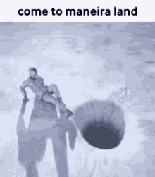 a man is sitting on top of a hole with the words come to maneira land above him .