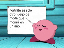 kirby is pointing to a sign that says fortnite es solo otro juego de moda que morira en un ano