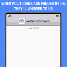 a phone screen shows the oakland government app