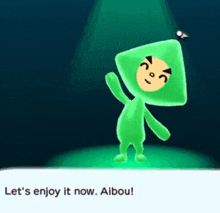 a green cartoon character is standing in a spotlight and says let 's enjoy it now . aibou .