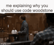 a man in a suit is standing in a courtroom and explaining why he should use code woodstone