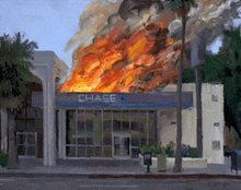 a chase bank is on fire with flames coming out of it