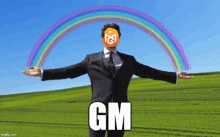 a man in a suit and tie is standing in front of a rainbow and the word gm is below him