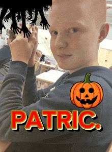 a boy with the name patric written on his shirt