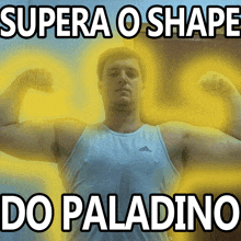 a man is flexing his muscles with the words supera o shape do paladino below him