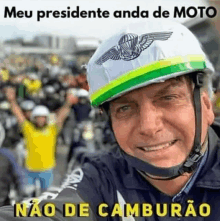 a man wearing a helmet with the words meu presidente anda de moto on the bottom