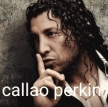 a man with curly hair is holding his finger to his mouth and the words callao perkins are written above him