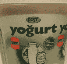 a drawing of a container of yogurt with a jar of milk