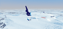 a blue and white airplane is flying over a snowy landscape