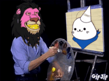 a man with a pink lion mask is painting a white cat