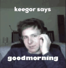 a man wearing headphones says keegor says goodmorning