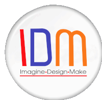 a button with the words imagine design make on it