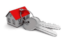 a house with a red roof is sitting next to a pair of keys on a keychain .