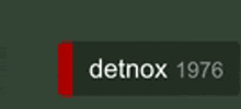 a green sign that says detnox 1976 with a red stripe