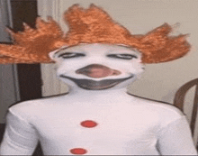 a person is wearing a clown costume with a wig on their head .