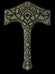 a hammer with a celtic design on it against a black background