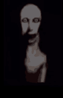 a blurred image of a scary face with blood coming out of its mouth .