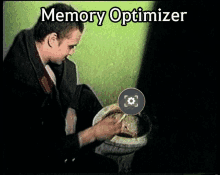 a man sitting on a toilet with the words memory optimizer written above him