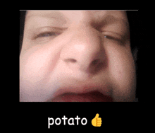 a close up of a person 's face with the word potato underneath