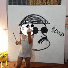 a little girl is standing in front of a drawing of a man with sunglasses and a mustache that says $ doap