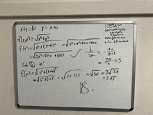 a whiteboard has a math problem written on it with the number 18 at the bottom