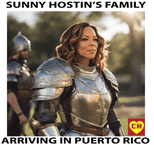 sunny hostin 's family arrives in puerto rico with a picture of a woman in armor