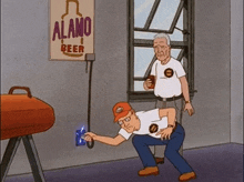 two men are squatting in front of a alamo beer sign