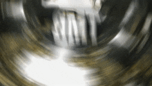 a blurred image of a person 's face with the word win in the center