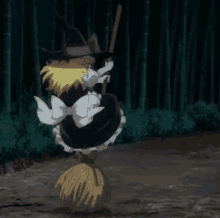 a cartoon witch is standing on a broom in the woods .