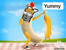 a cartoon of a banana holding a banana with the word yummy written on it