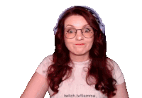 a woman with red hair wearing glasses and a headband with twitch.tv/fiamma written on it