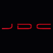 a red logo on a black background that says jdc .