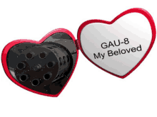 a heart shaped mirror with gau-8 my beloved on it