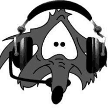 a cartoon coyote wearing headphones with a microphone .