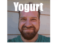 a man with a beard and yogurt on his head