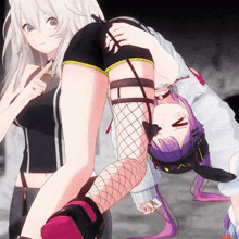 a girl with purple hair is laying on another girl 's stomach