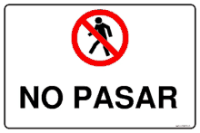 a sign that says no pasar has a red circle with a person in it