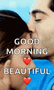 a man is kissing a woman on the cheek and the words `` good morning beautiful '' are above them .